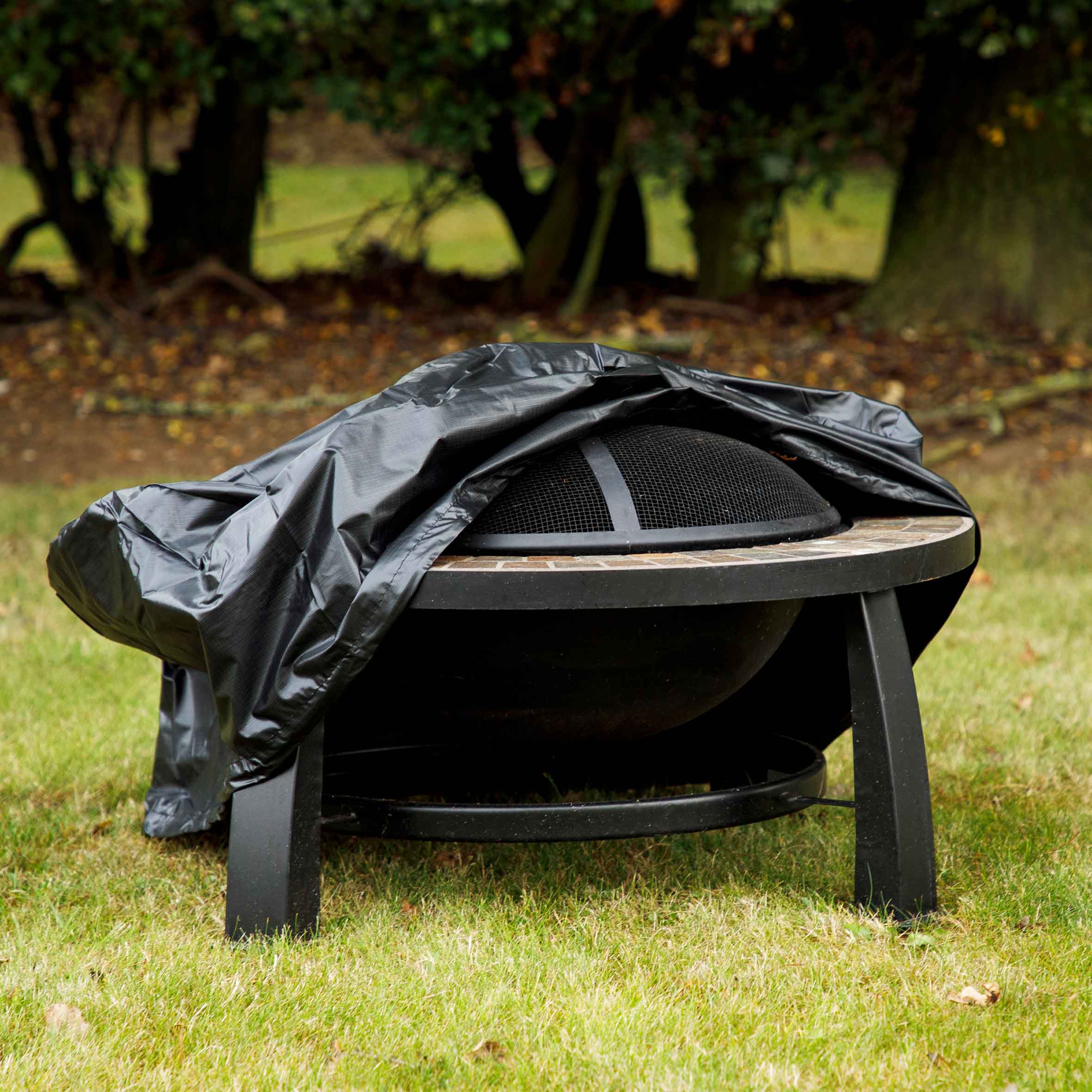 Dellonda DG121 Fire Pit Covers Action shot - cover - half - on