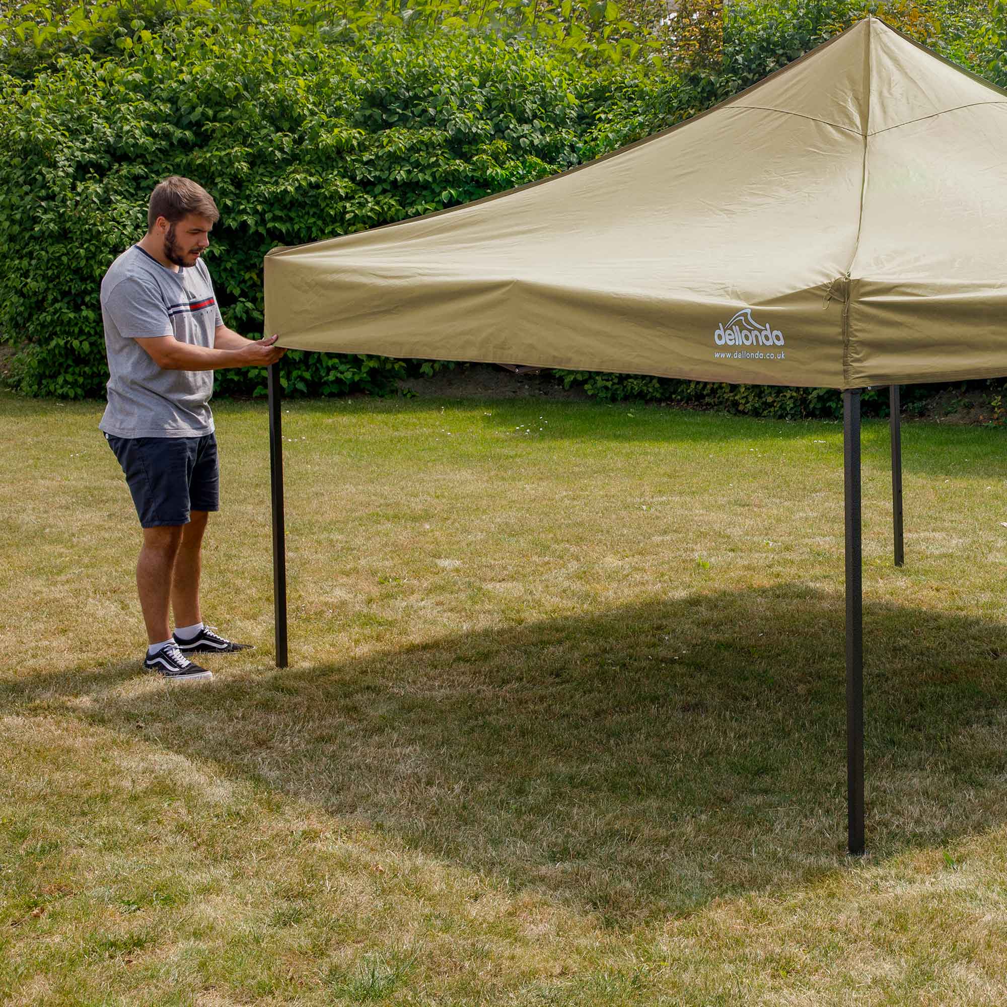 Dellonda DG126 Gazebos Action shot - extended - with cover - on