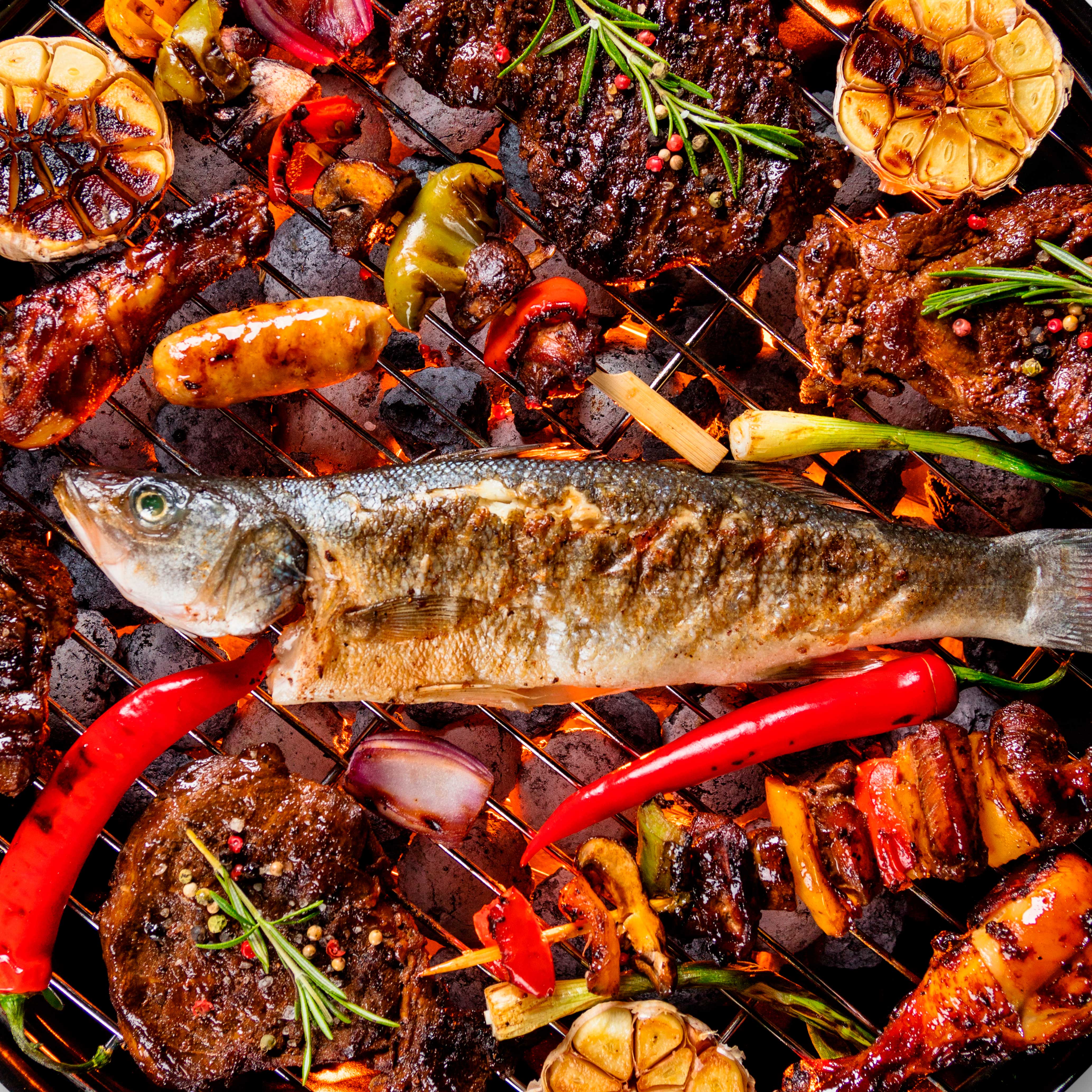 Dellonda DG159 Kamado Grills Action shot - fish - cooked - 2nd perspective