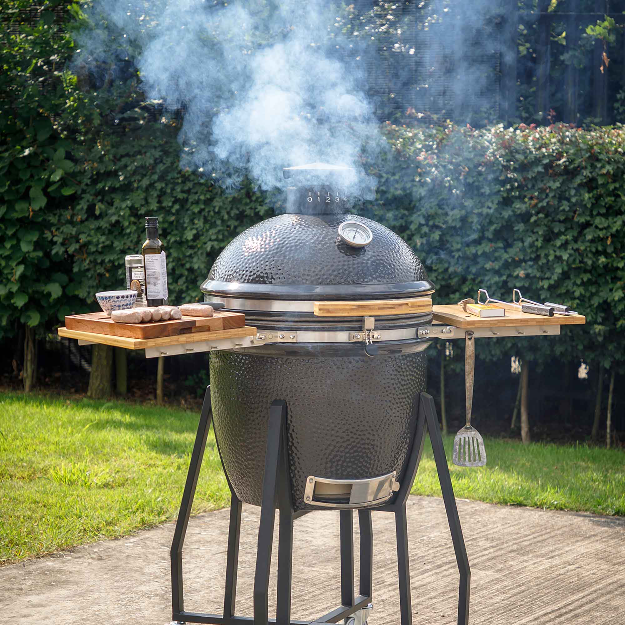 Dellonda DG159 Kamado Grills Action shot - in use - 2nd perspective