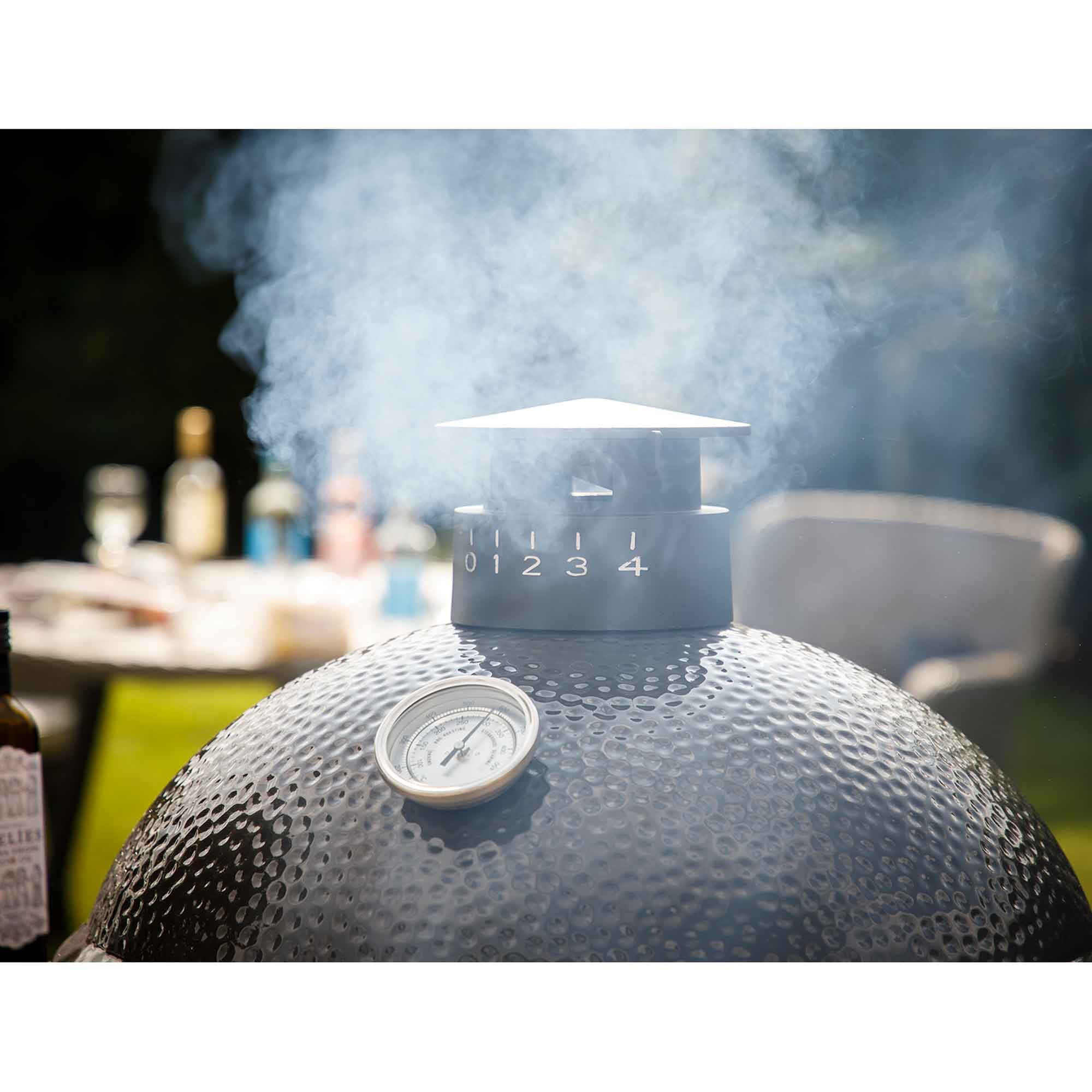 Dellonda DG159 Kamado Grills Action shot - regulation - cap - smoking
