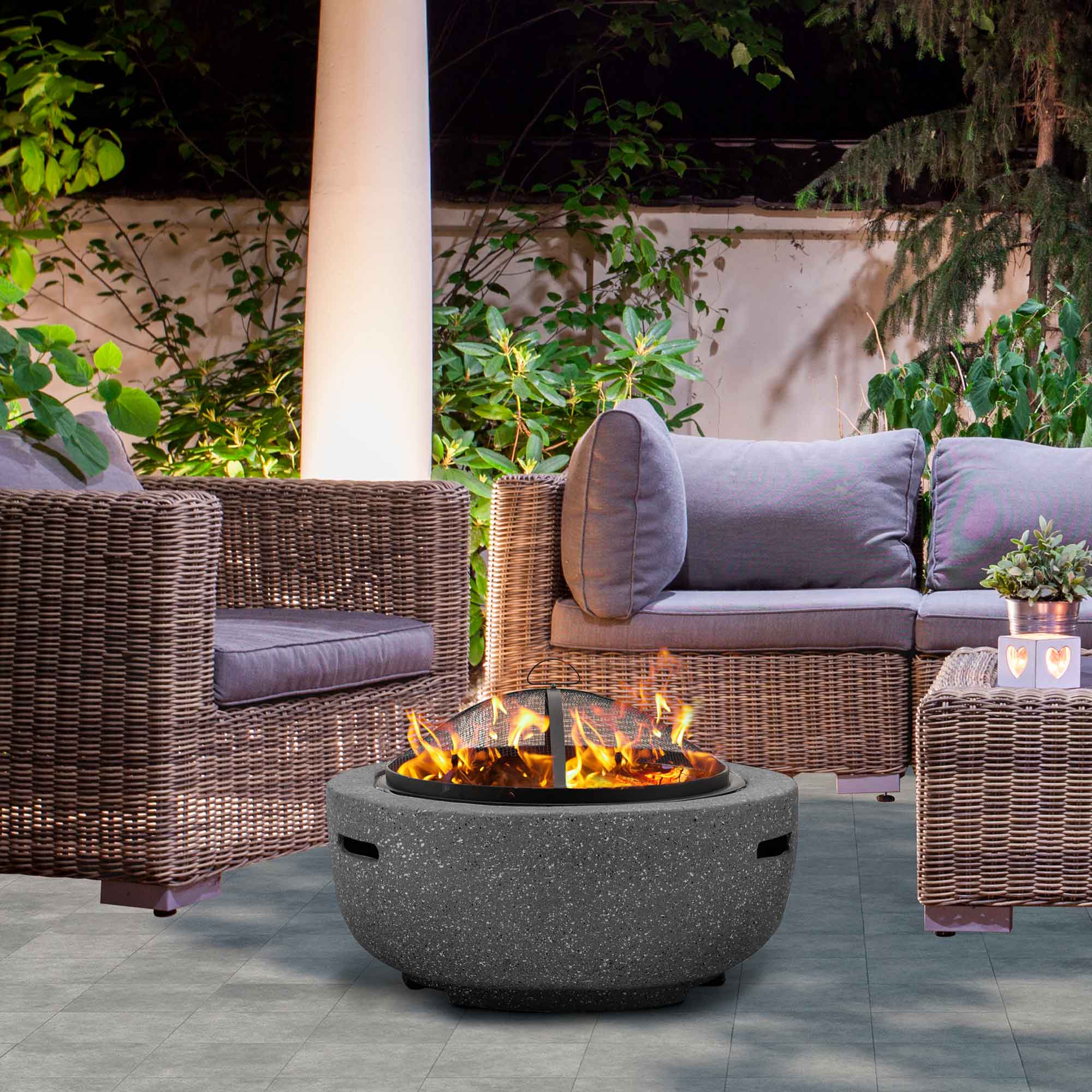 Dellonda DG189 Fire Pits Action shot - lifestyle in garden