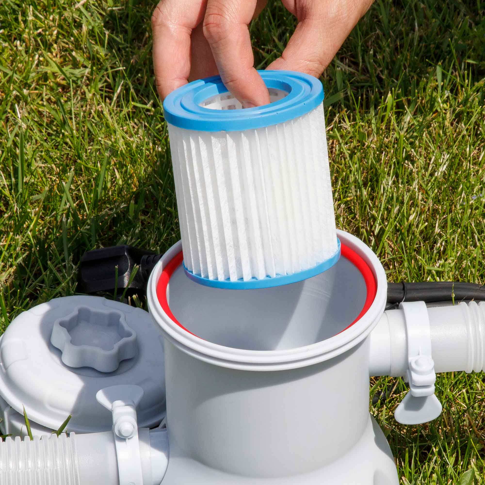 Dellonda DL19 Steel Frame Pools Action shot - putting - filter - into - pump