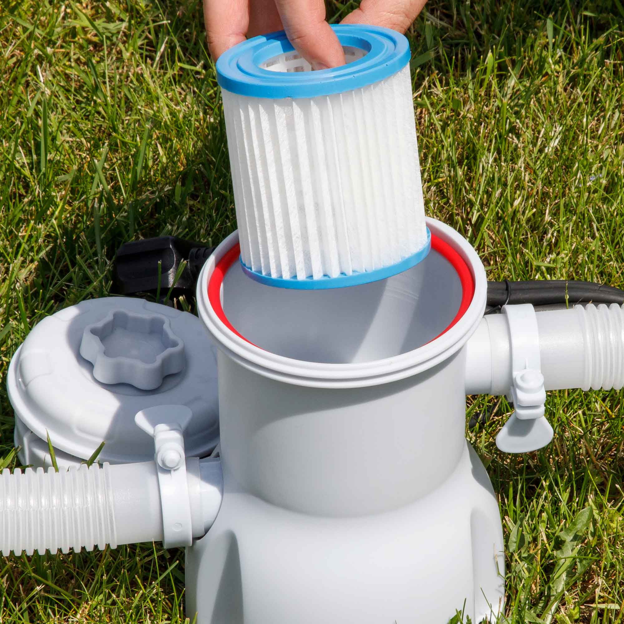 Dellonda DL20 Steel Frame Pools Action shot - putting - filter - into - pump