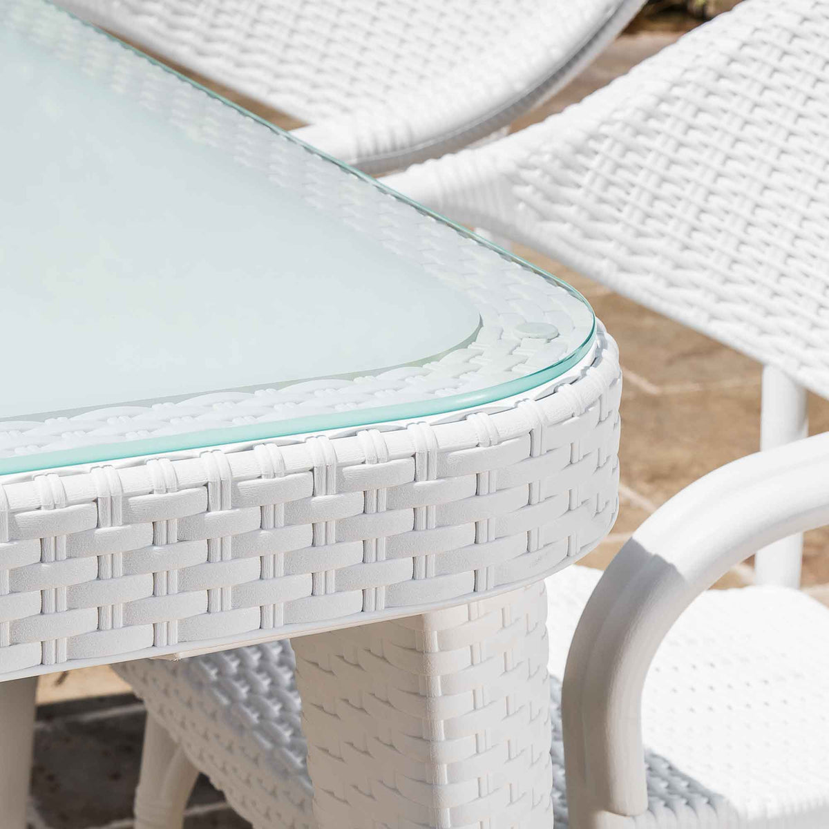White wicker outdoor store dining chairs