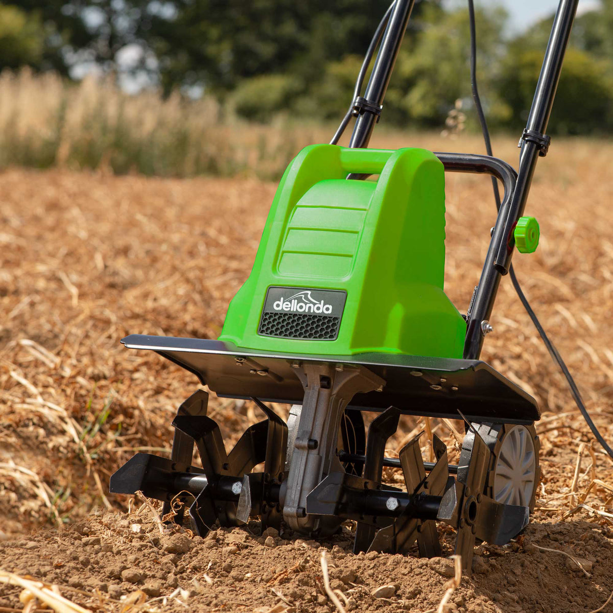 Tiller cultivator outlet
